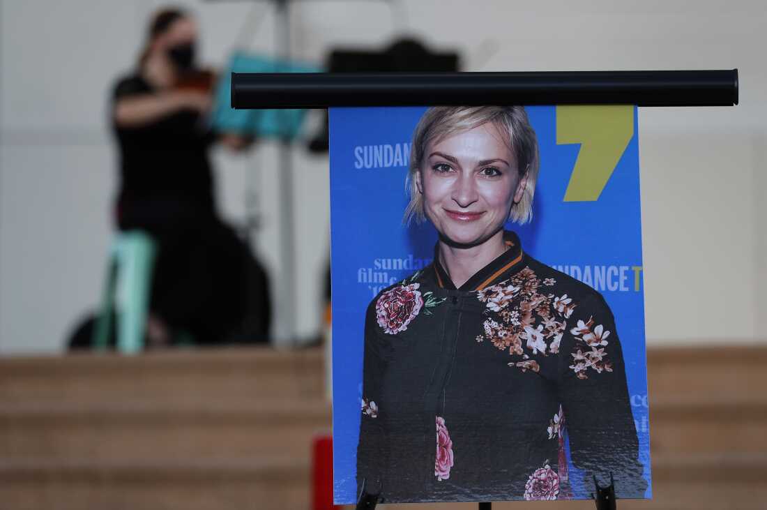 A photograph of cinematographer Halyna Hutchins on display during a vigil in her honor in Albuquerque, N.M., Oct. 23, 2021. 